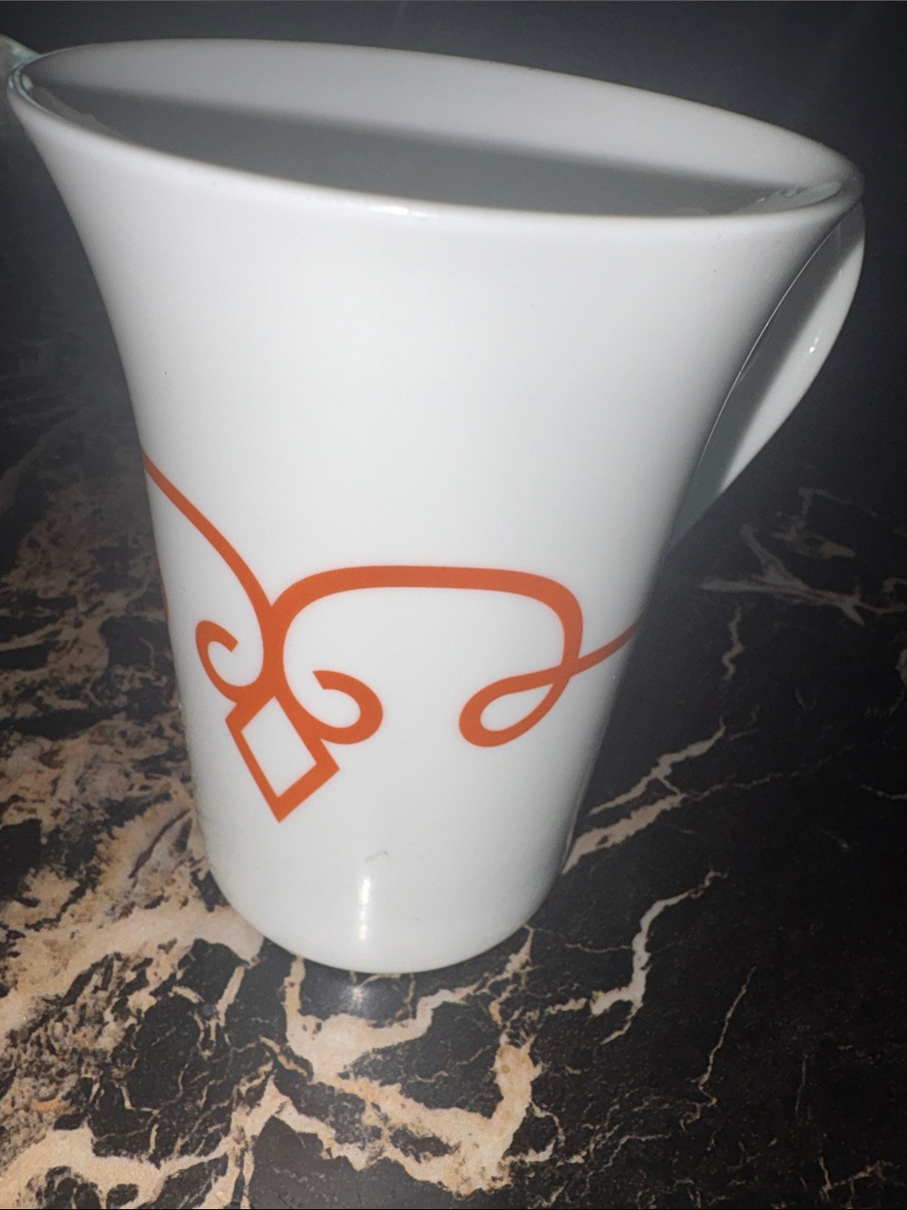 Starbucks White Ceramic Pitcher with Orange Scroll Motif